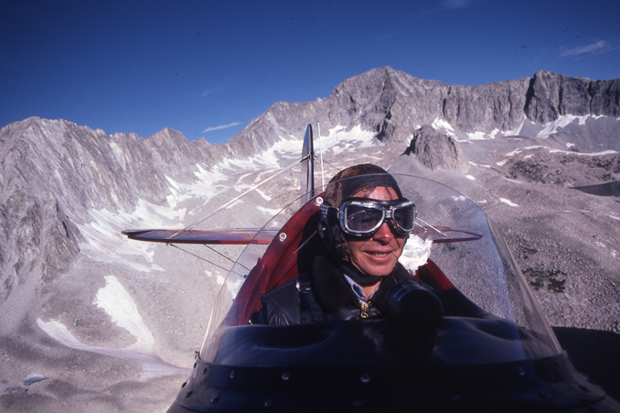 John Denver piloting a plane