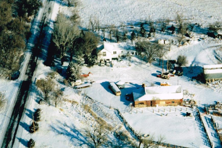 An overhead shot from the air of Carlson Farm, covered in snow.