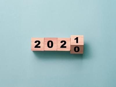 Flipping of wooden cubes block to change 2020 to 2021 year.