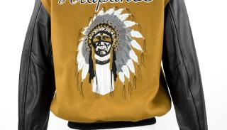 A sports jacket depicting a caricature of a Native American man and the team name "Apache."