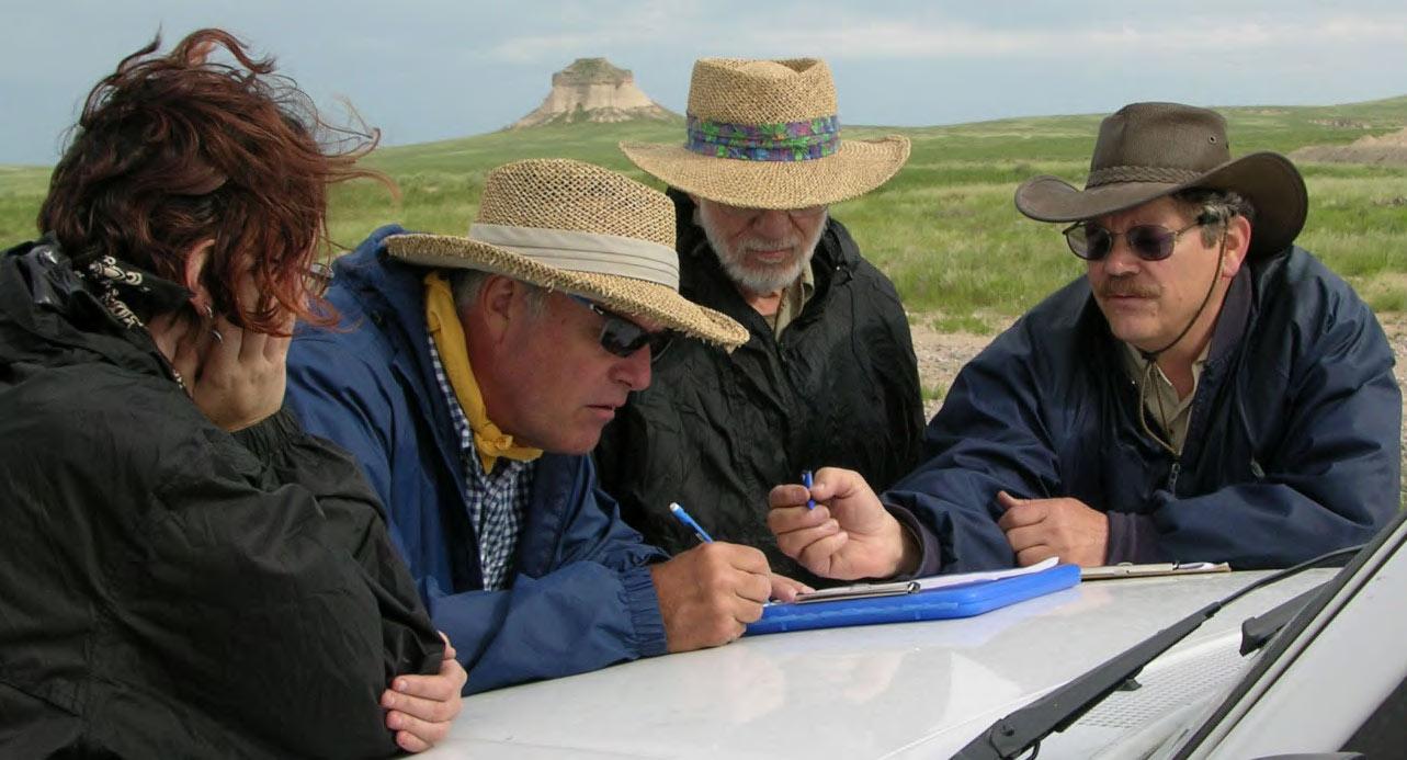 Three survey volunteers with former assistant State Archaeologist Keving Black (right) on the 2014 PAAC Summer Survey in the Pawnee National Grasslands