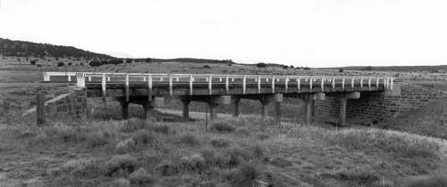 Black and white photo of a Timber Stringer bridge.