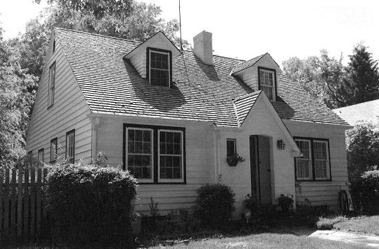black and white photo of a Cape Cod style home in Greeley.