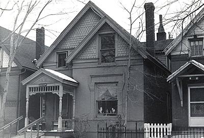 Black and white photograph of Queen Anne style house